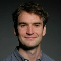 A portrait of Paul Sharratt